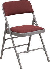 HERCULES Series Curved Triple Braced & Double Hinged Burgundy Patterned Fabric Upholstered Metal Folding Chair