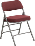 HERCULES Series Premium Curved Triple Braced & Double Hinged Burgundy Fabric Upholstered Metal Folding Chair