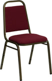 HERCULES Series Trapezoidal Back Stacking Banquet Chair with Burgundy Fabric and 1.5'' Thick Seat - Gold Vein Frame