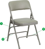 HERCULES Series Curved Triple Braced & Double Hinged Gray Vinyl Upholstered Metal Folding Chair